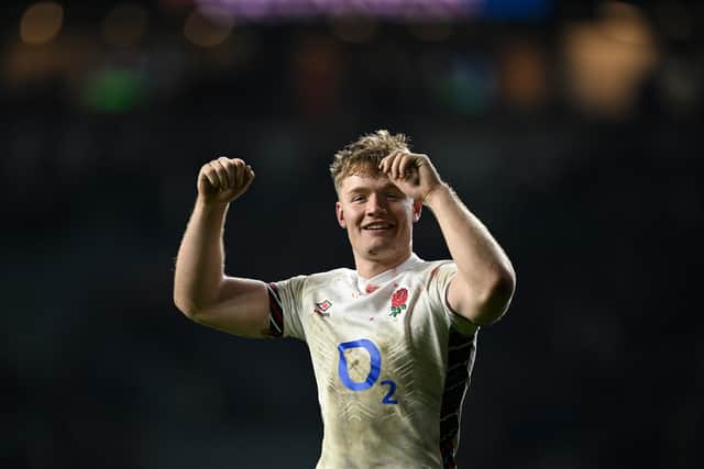 Fin Smith celebrates England's Six Nations win over France.