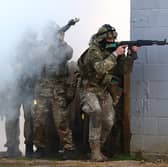 Ukrainian soldiers take part in a training exercise in eastern England last year (Picture: Henry Nicholls)