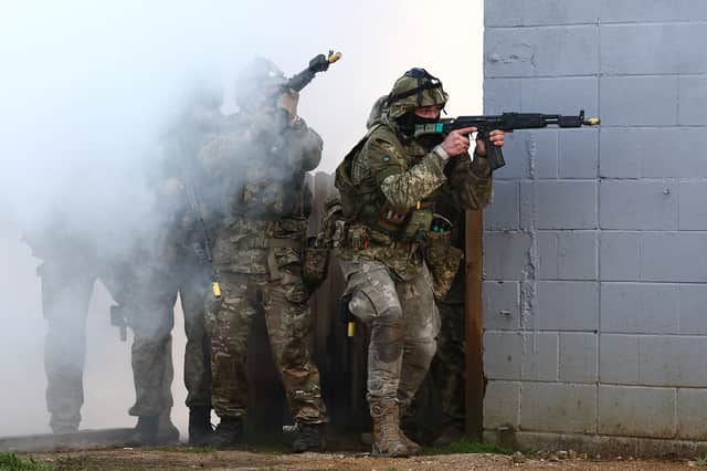 Ukrainian soldiers take part in a training exercise in eastern England last year (Picture: Henry Nicholls)