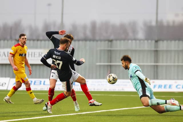 Scott Arfield nets the equaliser for Falkirk in their 2-2 draw with Ayr.