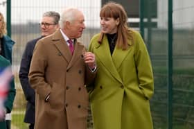 King Charles III, accompanied by Prime Minister Sir Keir Starmer and Deputy Prime Minister Angela Rayner