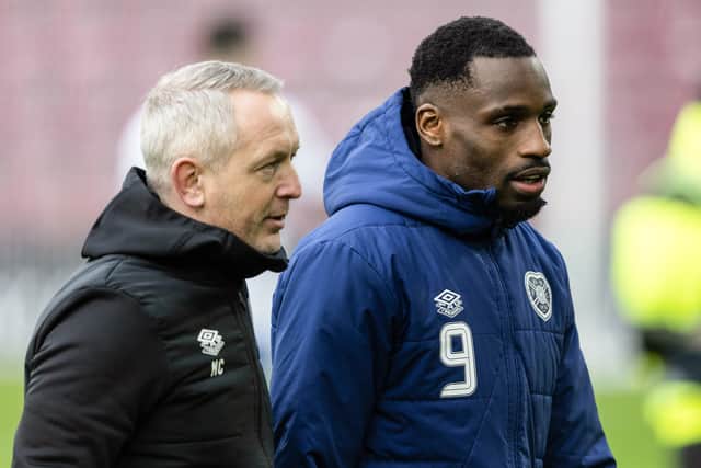 Hearts head coach Neil Critchley and Elton Kabangu at full time after the 3-1 defeat to Rangers. (Photo by Mark Scates / SNS Group)