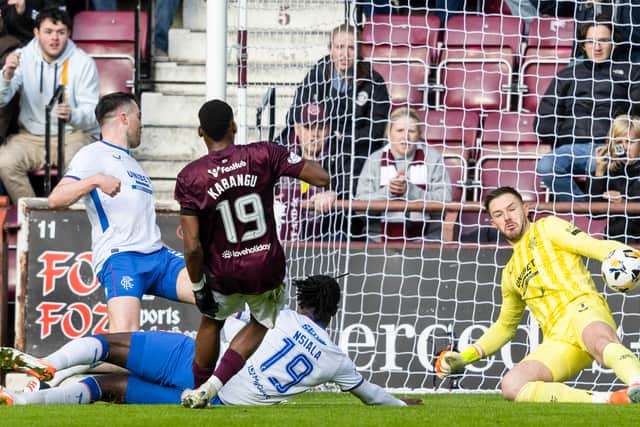 Hearts striker Elton Kabangu is denied by Rangers goalkeeper Jack Butland. (Photo by Mark Scates / SNS Group)