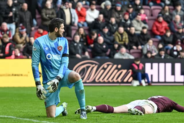 Hearts defender Jamie McCart looks dejected after scoring a second own goal to make it 3-1 to Rangers. (Photo by Rob Casey / SNS Group)