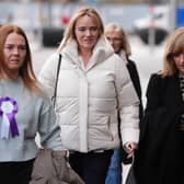 Nurse Sandie Peggie, centre, arrives at an employment tribunal in Dundee