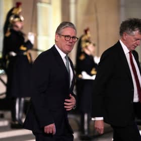 Sir Keir Starmer, left, leaves an informal meeting of leaders from key European Union nations and the United Kingdom, at the Elysee Palace in Paris