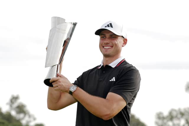 Ludvig Ãberg  poses with the trophy after winning The Genesis Invitational  at Torrey Pines Golf Course in La Jolla, California
