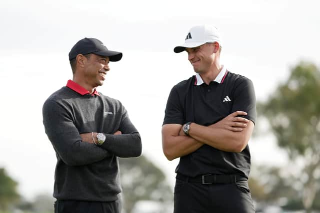 Tournament host Tiger Woods chats with new Genesis Invitational champion Ludvig Ãberg 