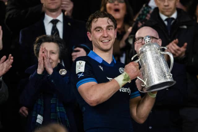 Scotland's Jamie Ritchie lifts the Calcutta Cup after the win over England at Twickenham in 2023.