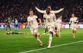 Alphonso Davies celebrates Bayern Munich's late goal.