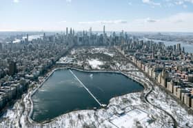 A high-flying photographer has captured New York covered in snow