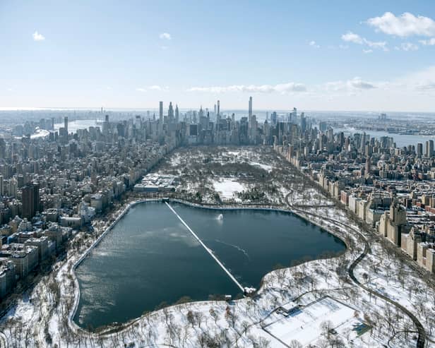 A high-flying photographer has captured New York covered in snow
