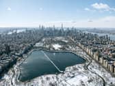A high-flying photographer has captured New York covered in snow