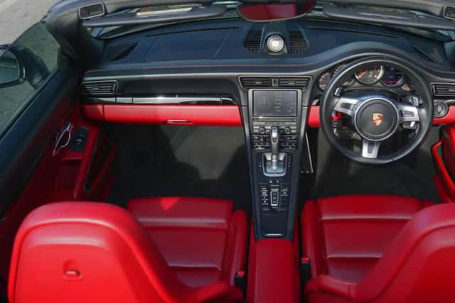 The bright red interior will lift the mood on a gloomy day