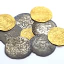 Undated handout photo issued by Crown Office and Procurator Fiscal Service of coins from Cappercleuch in the Borders