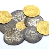 Undated handout photo issued by Crown Office and Procurator Fiscal Service of coins from Cappercleuch in the Borders