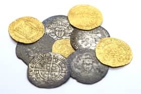 Undated handout photo issued by Crown Office and Procurator Fiscal Service of coins from Cappercleuch in the Borders