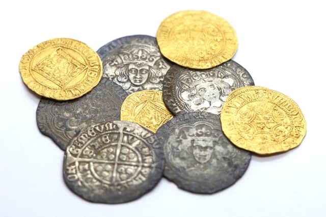 Undated handout photo issued by Crown Office and Procurator Fiscal Service of coins from Cappercleuch in the Borders