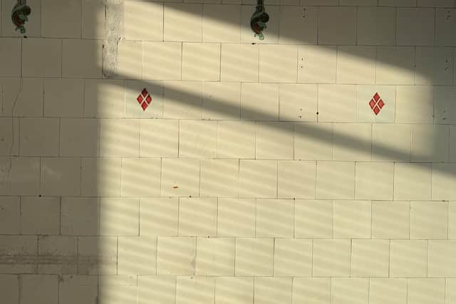 The tiled walls in old butcher shop