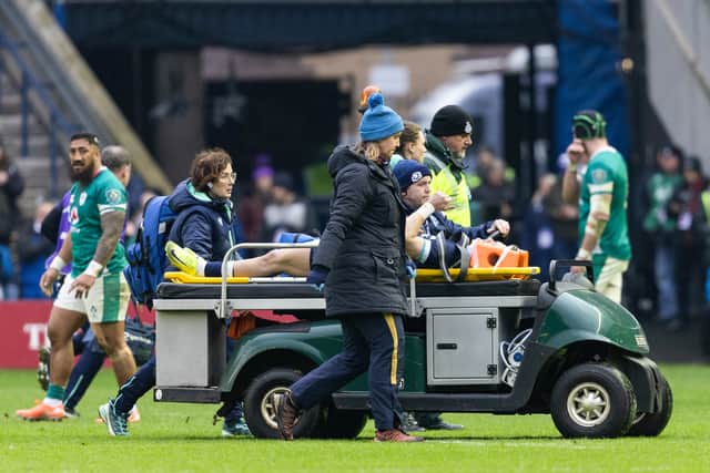 Scotland's Darcy Graham is taken off after clashing heads with Finn Russell against Ireland.