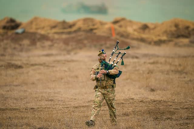 Lance Corporal Jamie Killorn plays the pipes during Nato's Steadfast Dart military exercise in Smardan, eastern Romania (Picture: Vadim Ghirda)
