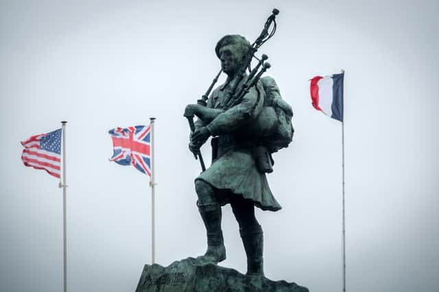 The statue of Bill Millin, who played the bagpipes as Allied forces landed at Sword Beach on D-Day in 1944, at Colleville-Montgomery near Caen, Normandy (Picture: Matt Cardy)