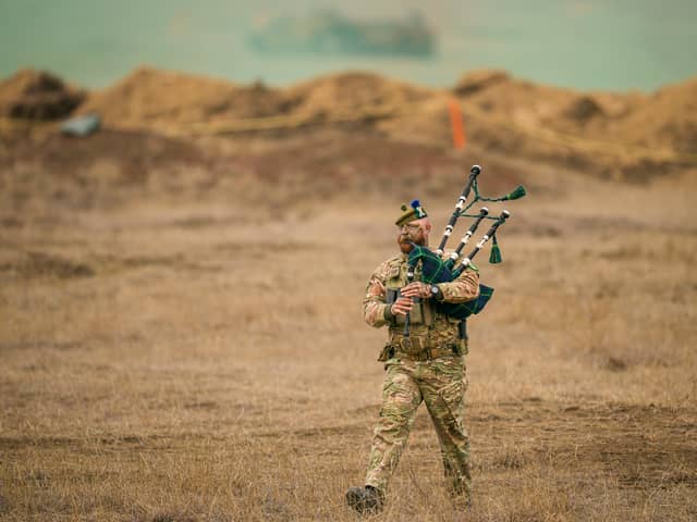Lance Corporal Jamie Killorn plays the pipes during Nato's Steadfast Dart military exercise in Smardan, eastern Romania (Picture: Vadim Ghirda)