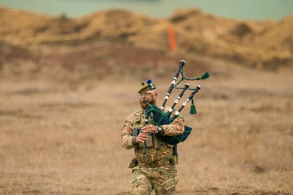 Lance Corporal Jamie Killorn plays the pipes during Nato's Steadfast Dart military exercise in Smardan, eastern Romania (Picture: Vadim Ghirda)