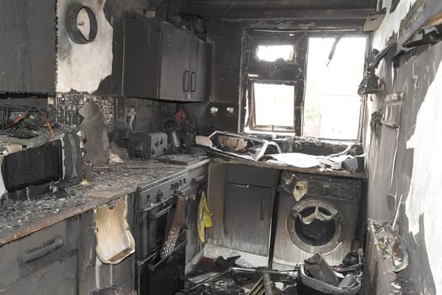 The burnt out remains of Natasha Johnson-Mall and Karlo Bogdan's home.