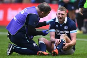 Finn Russell has been named in the Scotland XV to face England after being passed fit to play following his head knock against Ireland.
