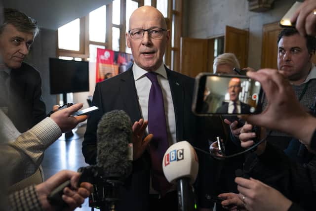 First Minister John Swinney