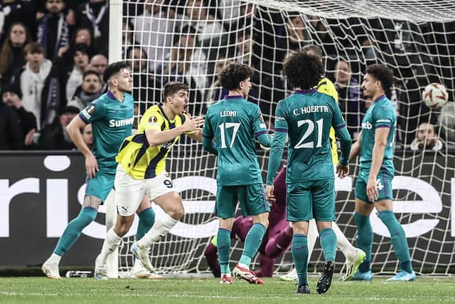 Fenerbahce's Yusuf Akcicek celebrates after scoring in the Europa League play-off round second leg match against Anderlecht. (Photo by BRUNO FAHY/BELGA MAG/AFP via Getty Images)