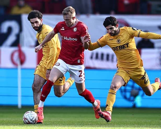 Scotland cap Ross McCrorie (centre) in action for Bristol City during the FA Cup tie against Wolves on January 11, 2025. (Photo by HENRY NICHOLLS/AFP via Getty Images)
