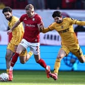 Scotland cap Ross McCrorie (centre) in action for Bristol City during the FA Cup tie against Wolves on January 11, 2025. (Photo by HENRY NICHOLLS/AFP via Getty Images)
