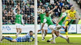 Celtic's Daizen Maeda scores in the 2-1 defeat to Hibs before VAR ruled it out for the ball being out of play in the build up. (Photo by Ross Parker / SNS Group)