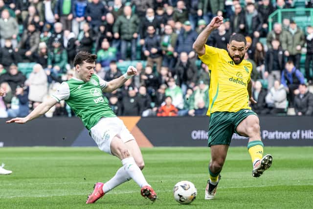 Josh Campbell picks his spot to Hibs 1-0 up against Celtic. (Photo by Paul Devlin / SNS Group)