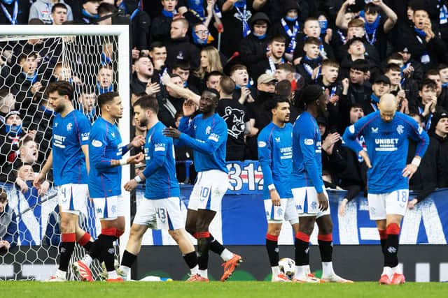 Rangers players look forlorn as St Mirren claim a historic 2-0 win at Ibrox.