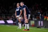 Scotland co-captain Finn Russell looks on as his kick to beat England sails wide.