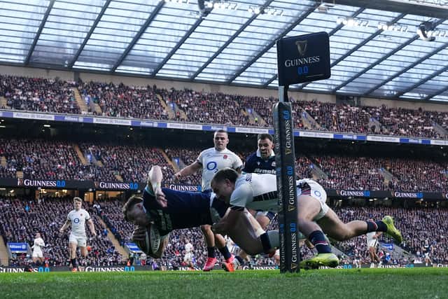 Huw Jones scores Scotland's second try in the 16-15 loss to England at Twickenham.