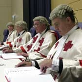 Police have called for Scottish courts to sit through the night to clear a backlog of cases