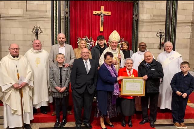 Chrissie O’ Neil received the Benemerenti medal from Pope Francis in a mass in St. Mary’s, Fort William.