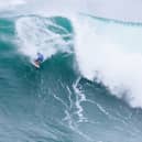 Scottish surfer Ben Larg, throwing himself into a characteristically high-risk manoeuvre at the Nazaré Big Wave Challenge on 18 February