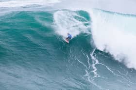Scottish surfer Ben Larg, throwing himself into a characteristically high-risk manoeuvre at the Nazaré Big Wave Challenge on 18 February