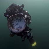Diver Graeme Bruce, of Easdale Island, retrieves a piece of Bell's Pottery from the wreck of the SS Eagle off the coast at Lamlash Bay, Arran. PIC: Naomi Watson.