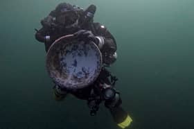 Diver Graeme Bruce, of Easdale Island, retrieves a piece of Bell's Pottery from the wreck of the SS Eagle off the coast at Lamlash Bay, Arran. PIC: Naomi Watson.