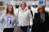 Nurse Sandie Peggie, centre, arrives at an employment tribunal in Dundee