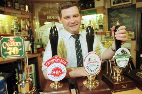 Halfway House Pub manager David Richer celebrates being included in the Good Beer Guide for the sixth year in a row in 1998