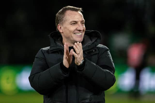 Celtic manager Brendan Rodgers applauds the fans after beating Aberdeen.