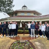 The group of East Lothian youngsters and the leaders who accompanied them on the trip to North Carolina pictured at the Payne Stewart statue at Pinehurst