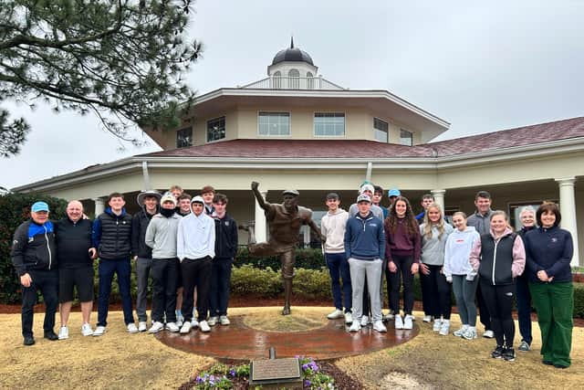 The group of East Lothian youngsters and the leaders who accompanied them on the trip to North Carolina pictured at the Payne Stewart statue at Pinehurst